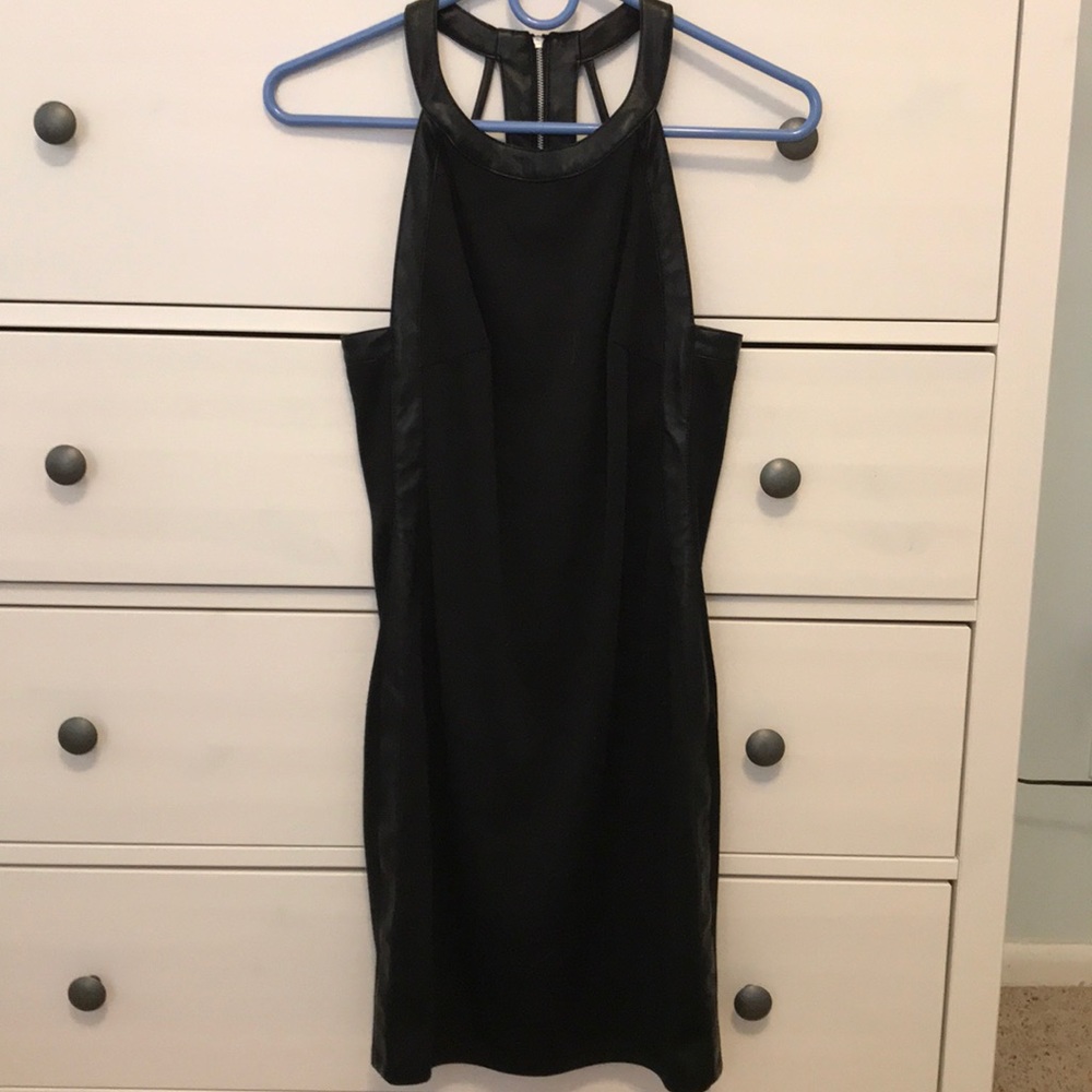 Black figure hugging leather and cotton mini dress